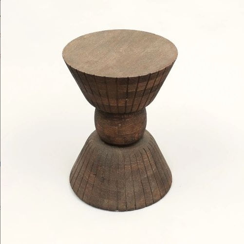 Brown hourglass-shaped wooden side table