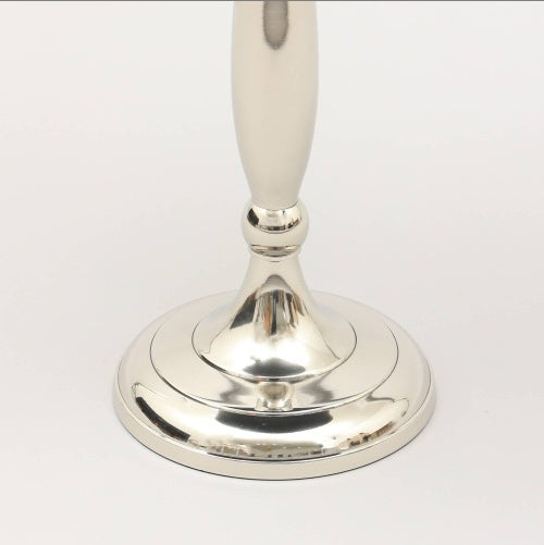 Base of a minimalist accent table in glossy silver finish